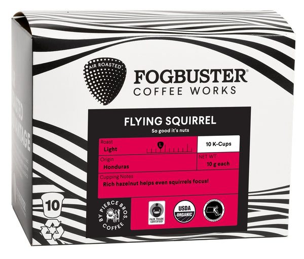 A box of Fogbuster® Coffee Works' Air-Roasted - Single Serve K-Cups contains 10 single-serve pods, each 10g. This light roast, crafted from premium shade-grown coffee in Honduras, features rich hazelnut cupping notes. The packaging emphasizes the USDA Organic certification and the use of air roasting technology for superior flavor.