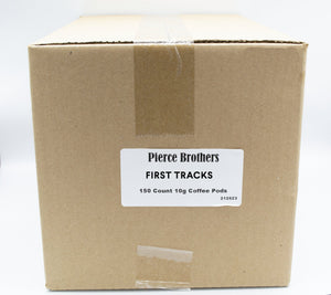 A large brown cardboard box labeled "Fogbuster® Coffee Works Single Serve Coffee Pods, 150 Count, 10g" sits against a plain white background—designed for pod brewers and not K-Cups.