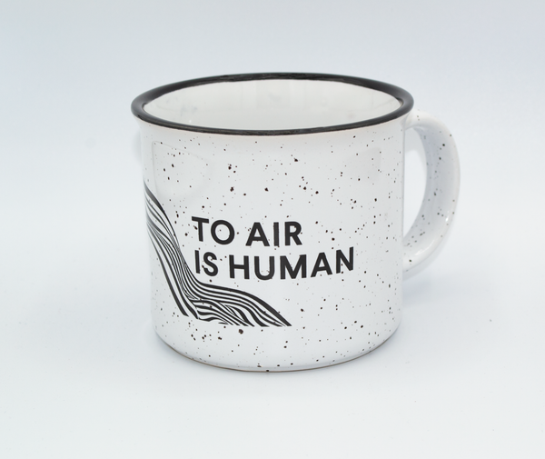 Grey, ceramic mug, featuring the classic Fogbuster® Coffee works waves and pick design, and the words To Air Is Human®